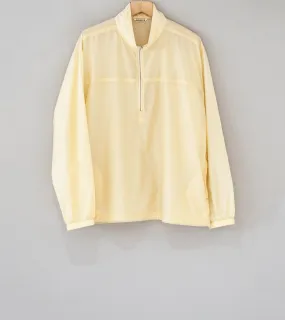 Auralee 'Light Nylon Half Zip P/O' (Light Yellow)