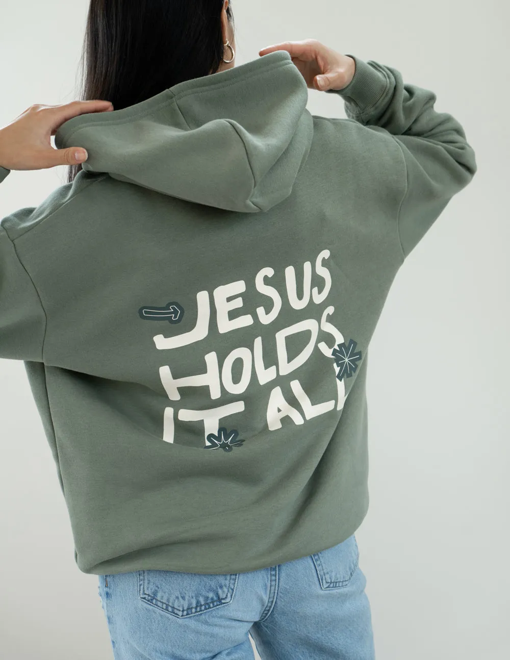 Jesus Holds It All Unisex Hoodie