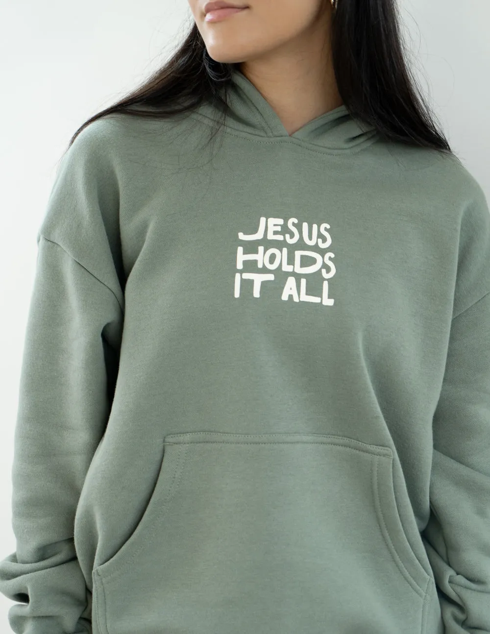 Jesus Holds It All Unisex Hoodie